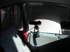 Yaesu FT-857D control head mounted (with a suction cup mount from a Sirius radio) on pilot's window. The rig itself is in the baggage compartment, and the antenna is mounted on the bottom of the aft fuselage just ahead of the empennage. A handheld microphone is used, and the audio output is fed into the pilot's headset via a cellphone adapter. IMG_2079.JPG